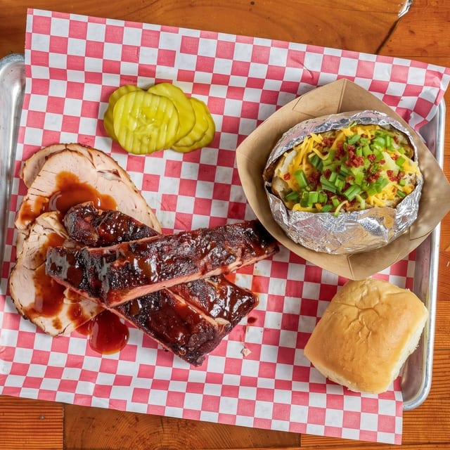 Pork Rib Plate with Overstuffed Potato.