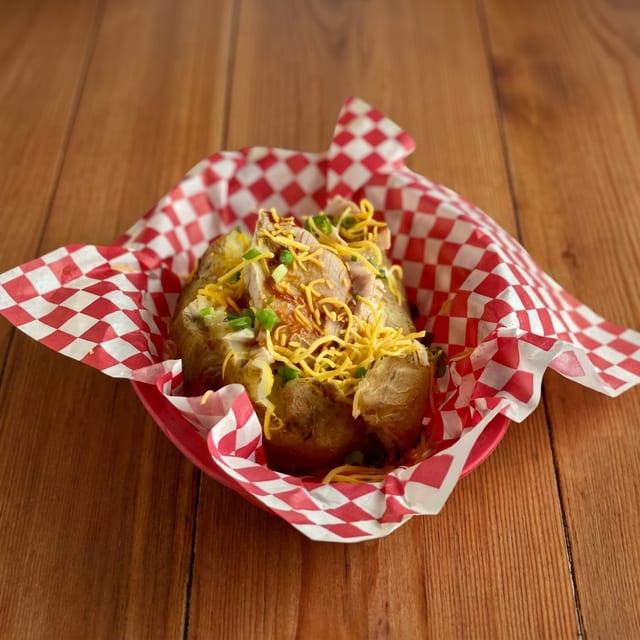Giant Overstuffed Potato with Choice of Topping.