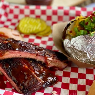 Pork Rib Plate with Overstuffed Potato